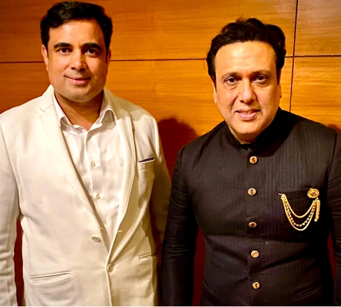 pt pawan kaushik with the famous bollywood celebrity govinda